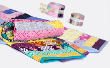 Tagesdecke Quilt mit Jelly-Rolls nähen