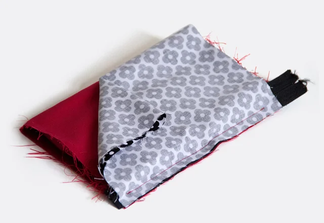 Nähanleitung Schleifentasche Kosmetiktasche Reißverschluss feststeppen