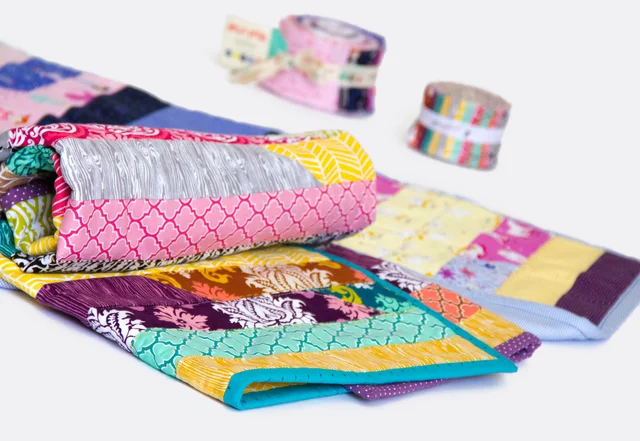Tagesdecke Quilt mit Jelly-Rolls nähen Tagesdecke Quilt mit Jelly-Rolls nähen