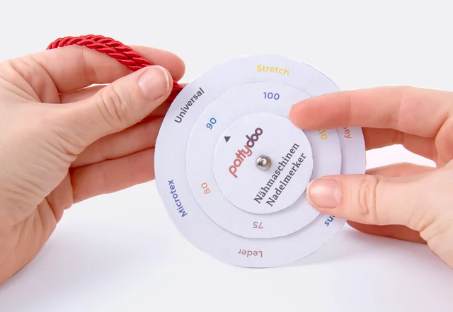 Nähmaschinennadelmerker einstellen