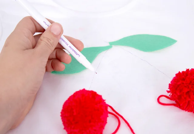 Pompoms selber machen Schlüsselanhänger