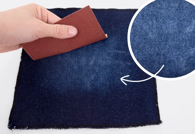 Used Look bei Jeans mit Schmirgelpapier