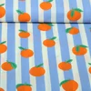 Beschichtete Baumwolle Orangen Blau