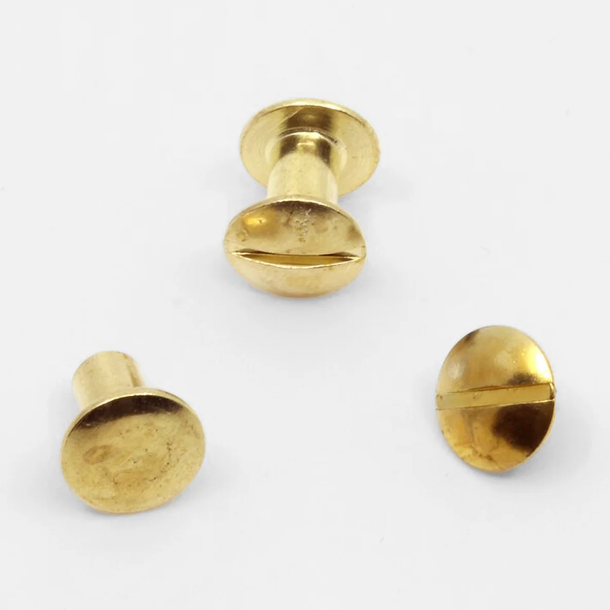 Buchschrauben Details gold