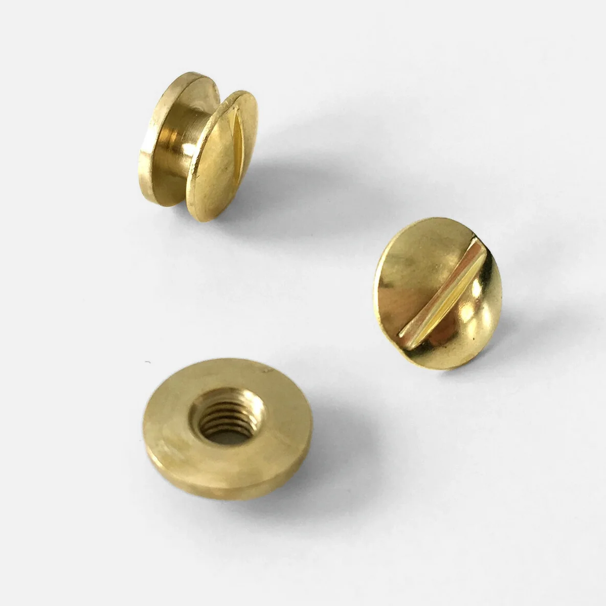 Buchschrauben Details gold