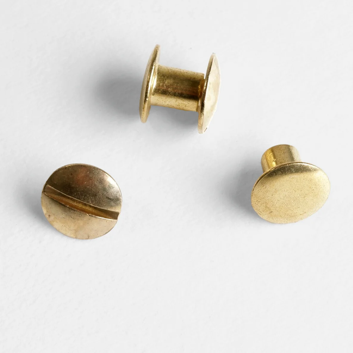 Buchschrauben Details gold