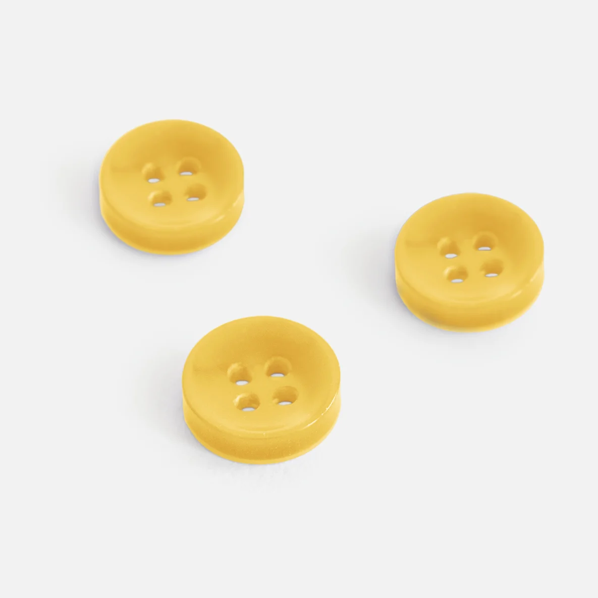 Knopf Perlmutt-Optik Gelb