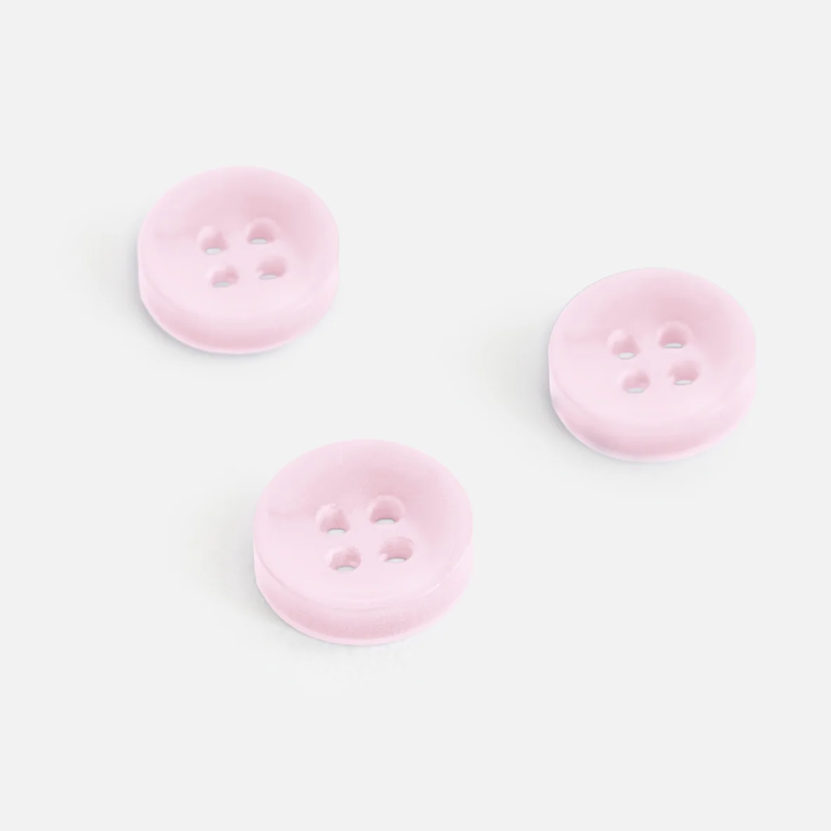 Knopf Perlmutt-Optik Rosa