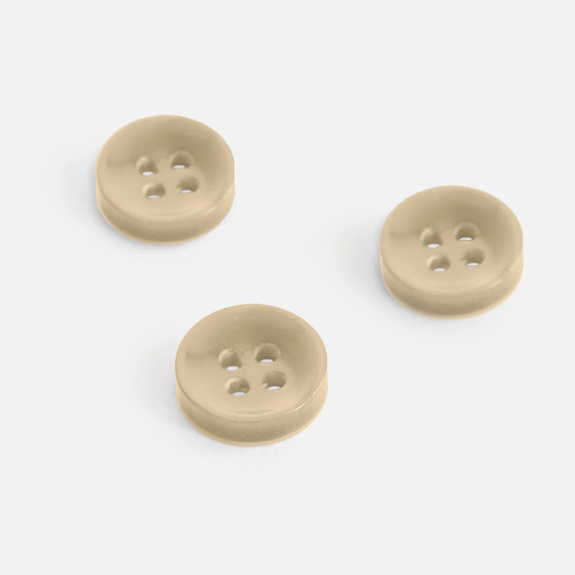 Knopf Perlmutt-Optik Sand