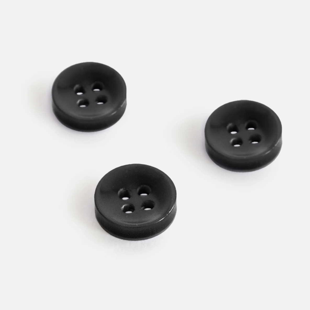 Knopf Perlmutt-Optik Schwarz