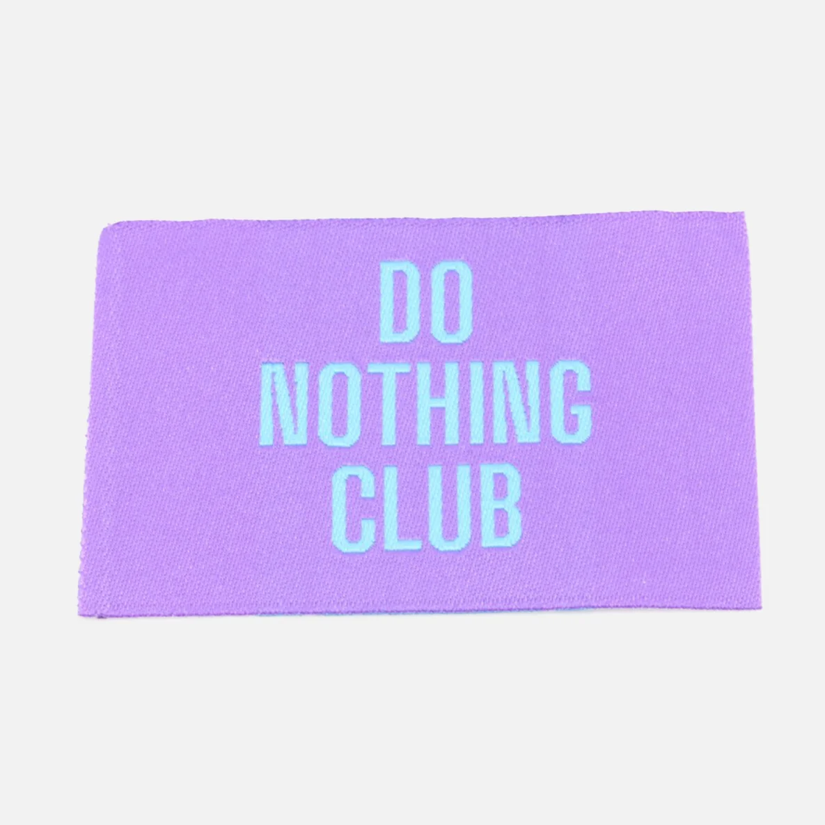 Webetikett "Do Nothing Club", Lila, 57x38 mm, 1 Stück