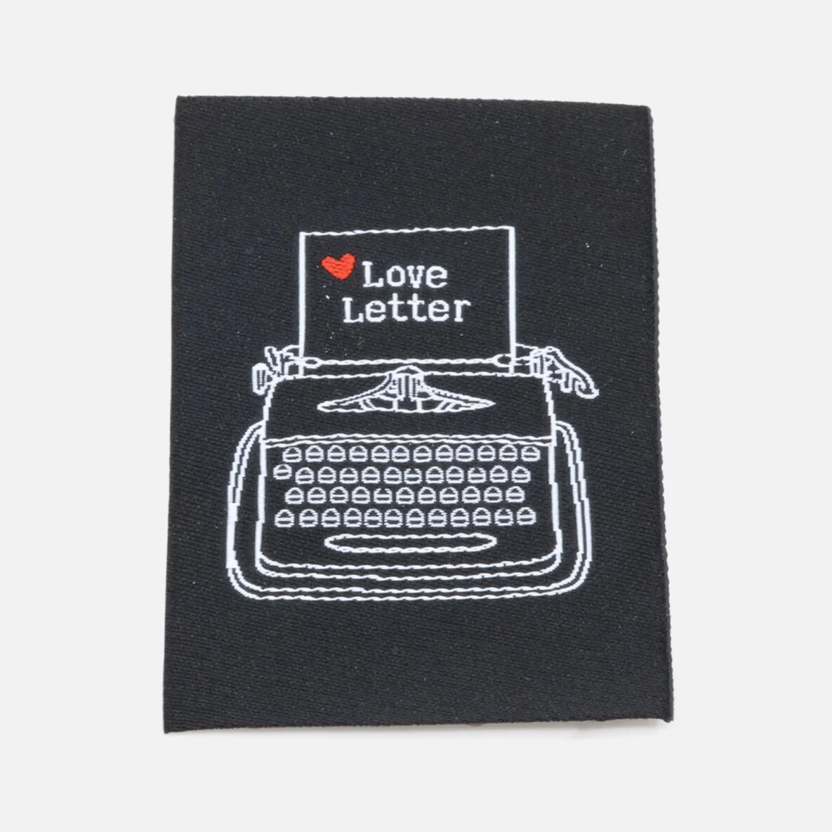 Webetikett "Schreibmaschine", 38x57 mm, 1 Stück