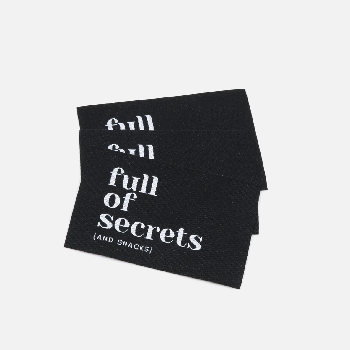 Webetikett L "full of secrets", 57x38 mm