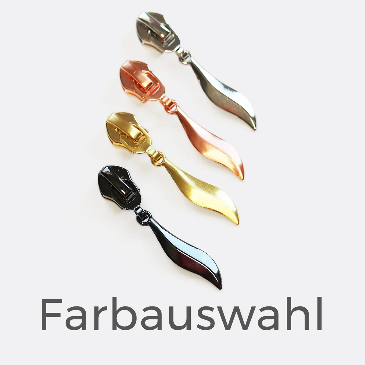 Zipper in Blattform in den Farben gold, silber, kupfer und gunmetal