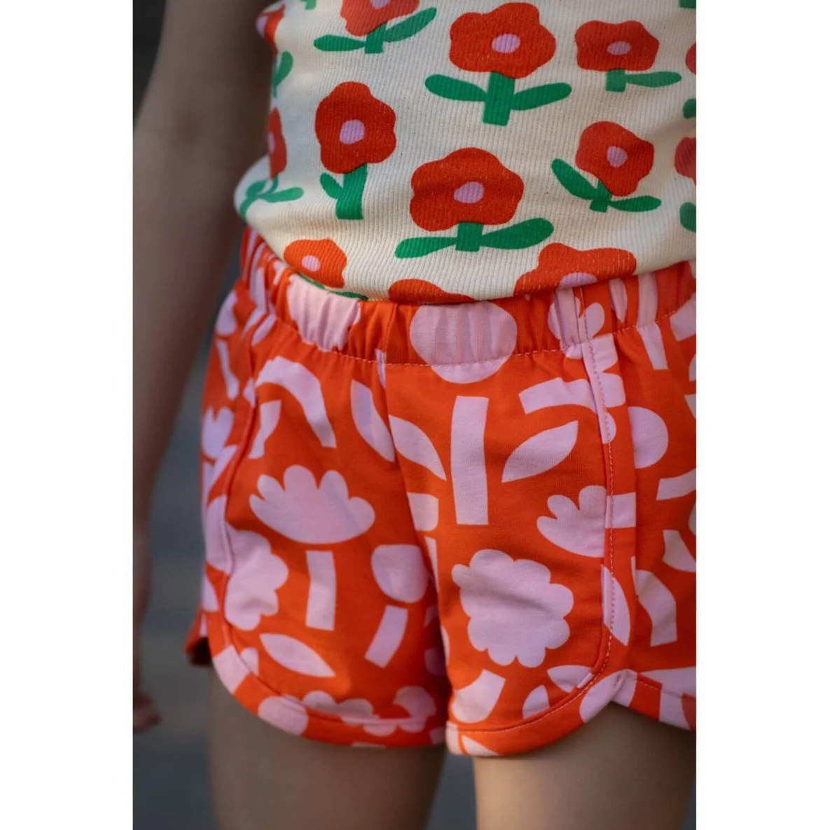 Bio Rippjersey Jennifer Bouron Blumen Natur Orange