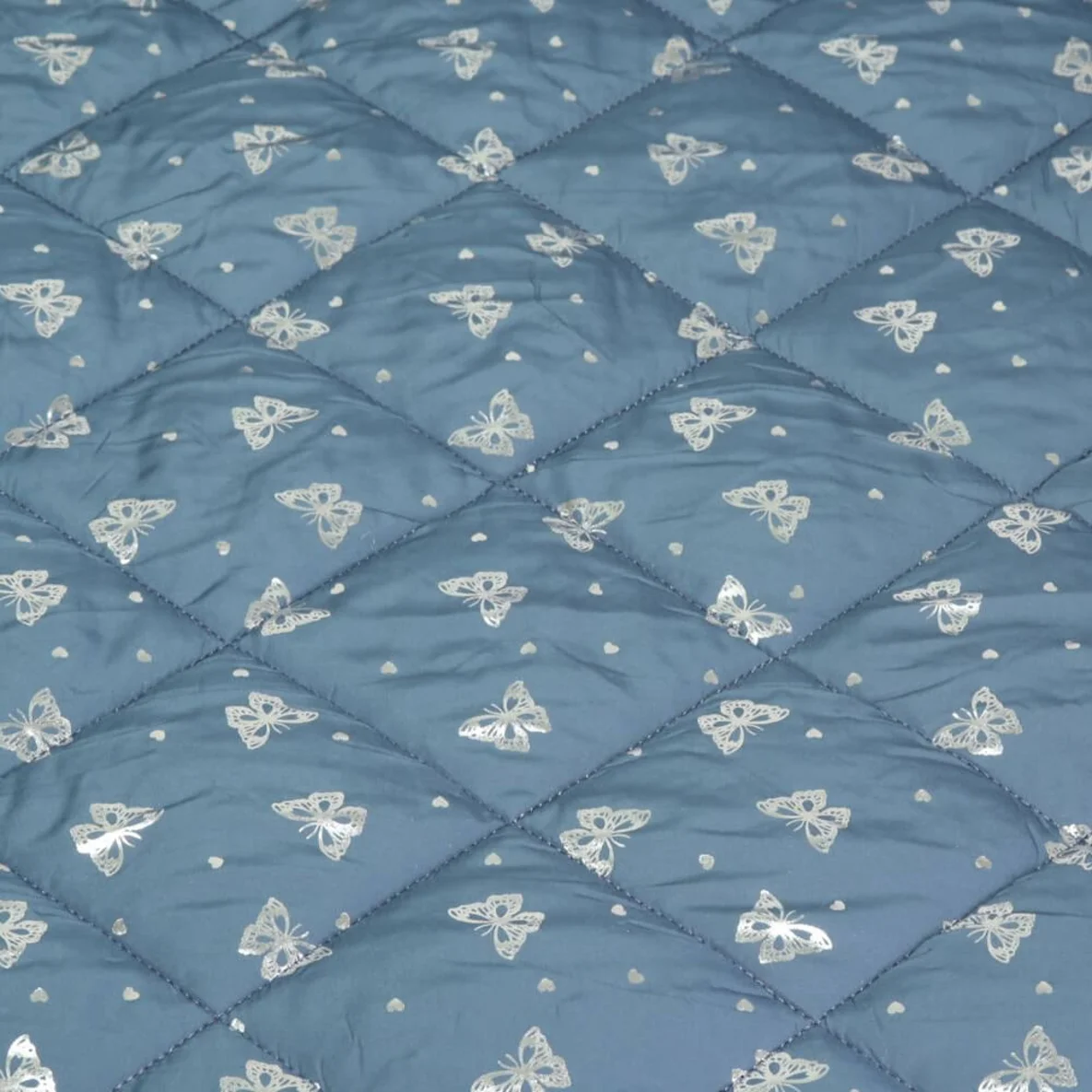 Gesteppter Jackenstoff Schmetterlinge Foliendruck Jeansblau
