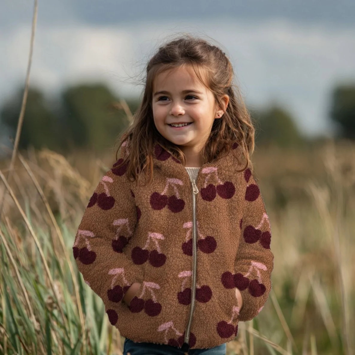 Teddyfleece Jacquard Kirschen Braun