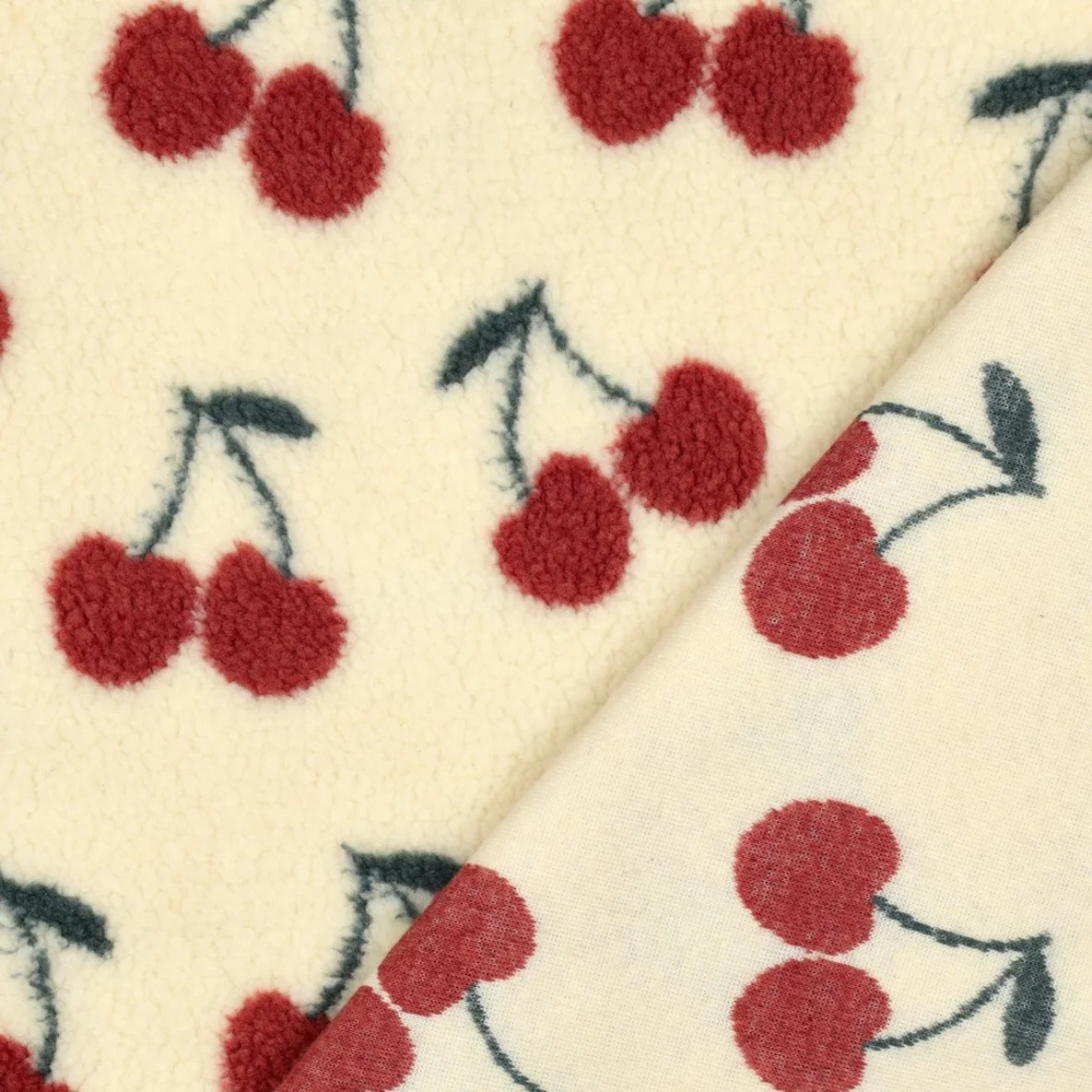 Teddyfleece Jacquard Kirschen Ecru
