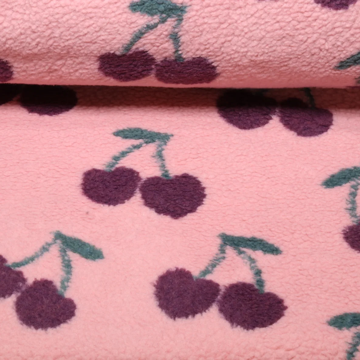 Teddyfleece Jacquard Kirschen Rosa