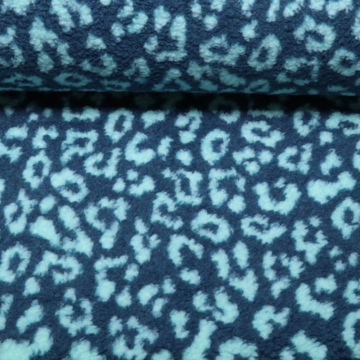 Teddyfleece Jacquard Leo Blau Türkis