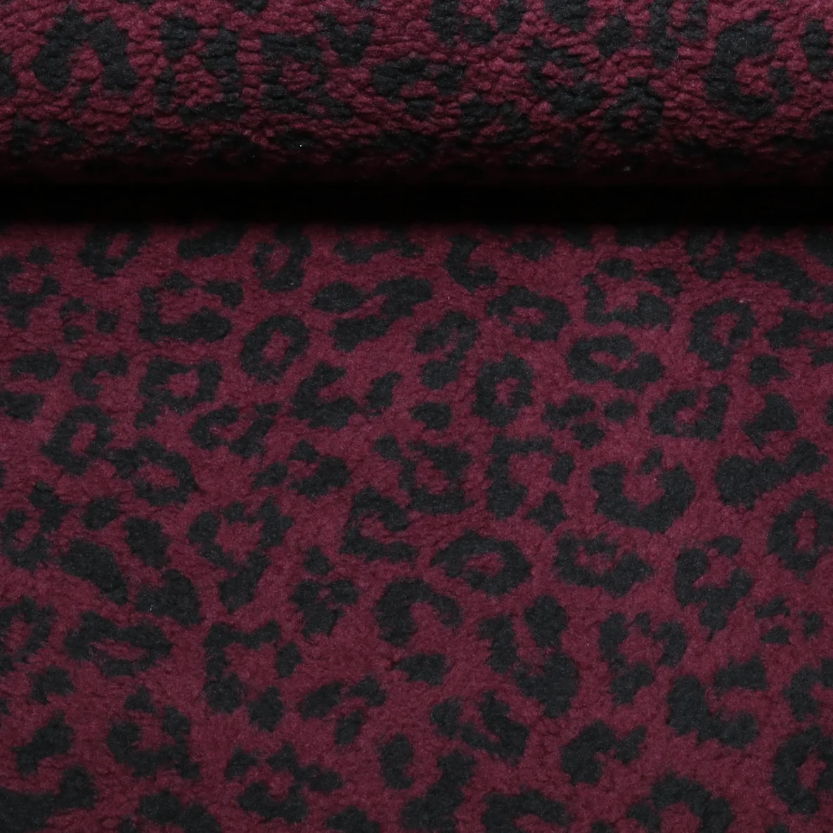 Teddyfleece Jacquard Leo Weinrot Schwarz