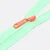 Rückseiten Reverse Zipper in Orange 4mm Perlonraupe auf mintfarbenem Endlos-Reißverschluss
