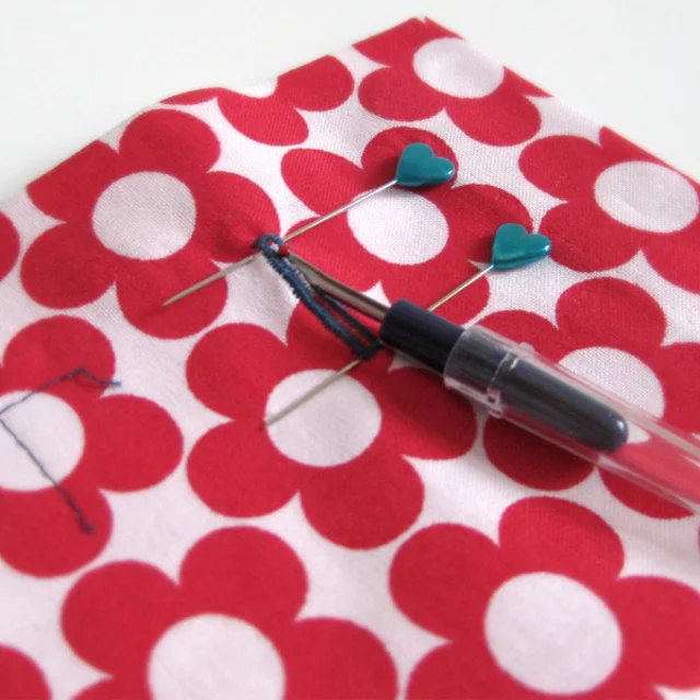 Knopfloch auftrennen